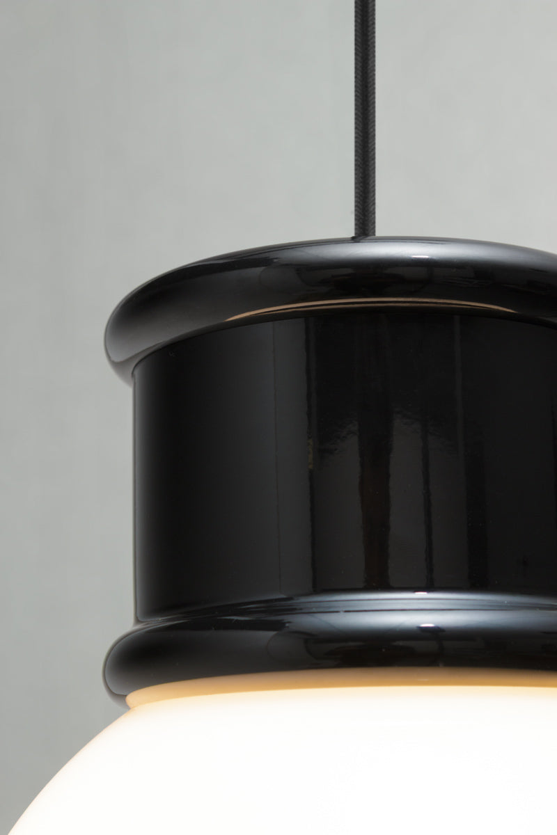 Close up of the black short brickworks pendant topper. 