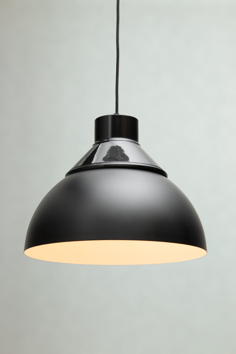 Dome Foundry Pendant Light in black with industrial metal dome shade and warm white interior