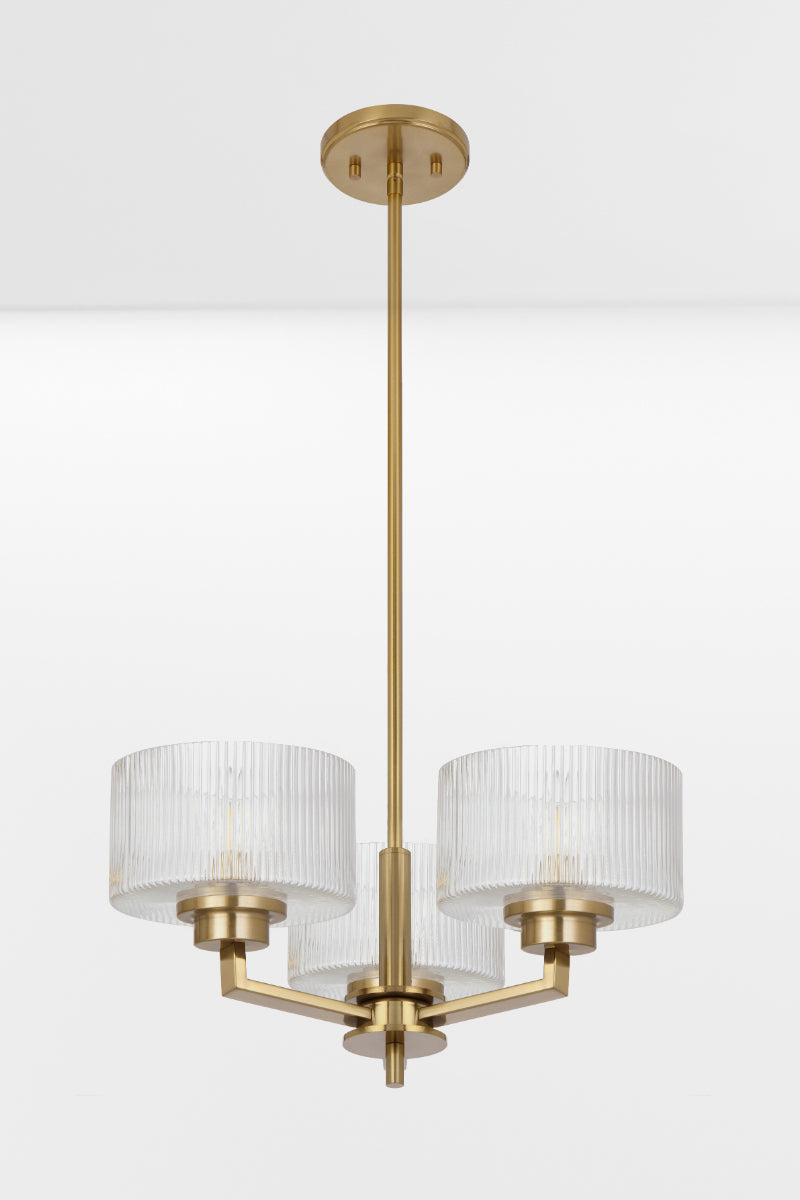 Antique Gold 3 light chandelier with clear reeded open glass shades. 