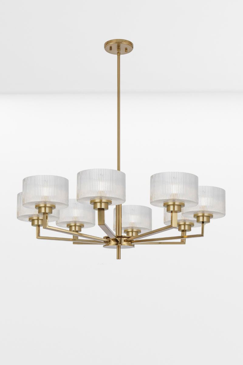 Antique Gold 8 light chandelier with clear reeded open glass shades. 