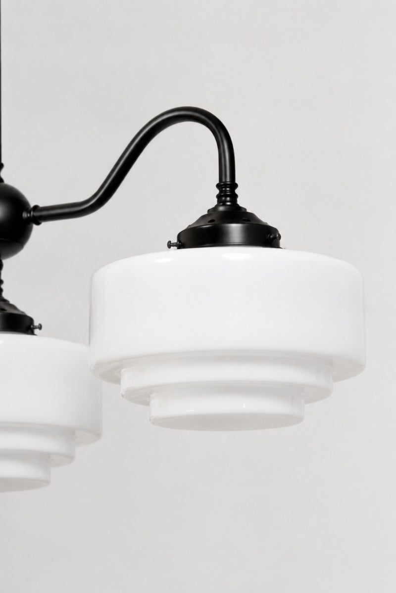Cropped side profile of the Regis Glass Deco Gooseneck Chandelier highlighting curved black gooseneck arm and opal glass shade