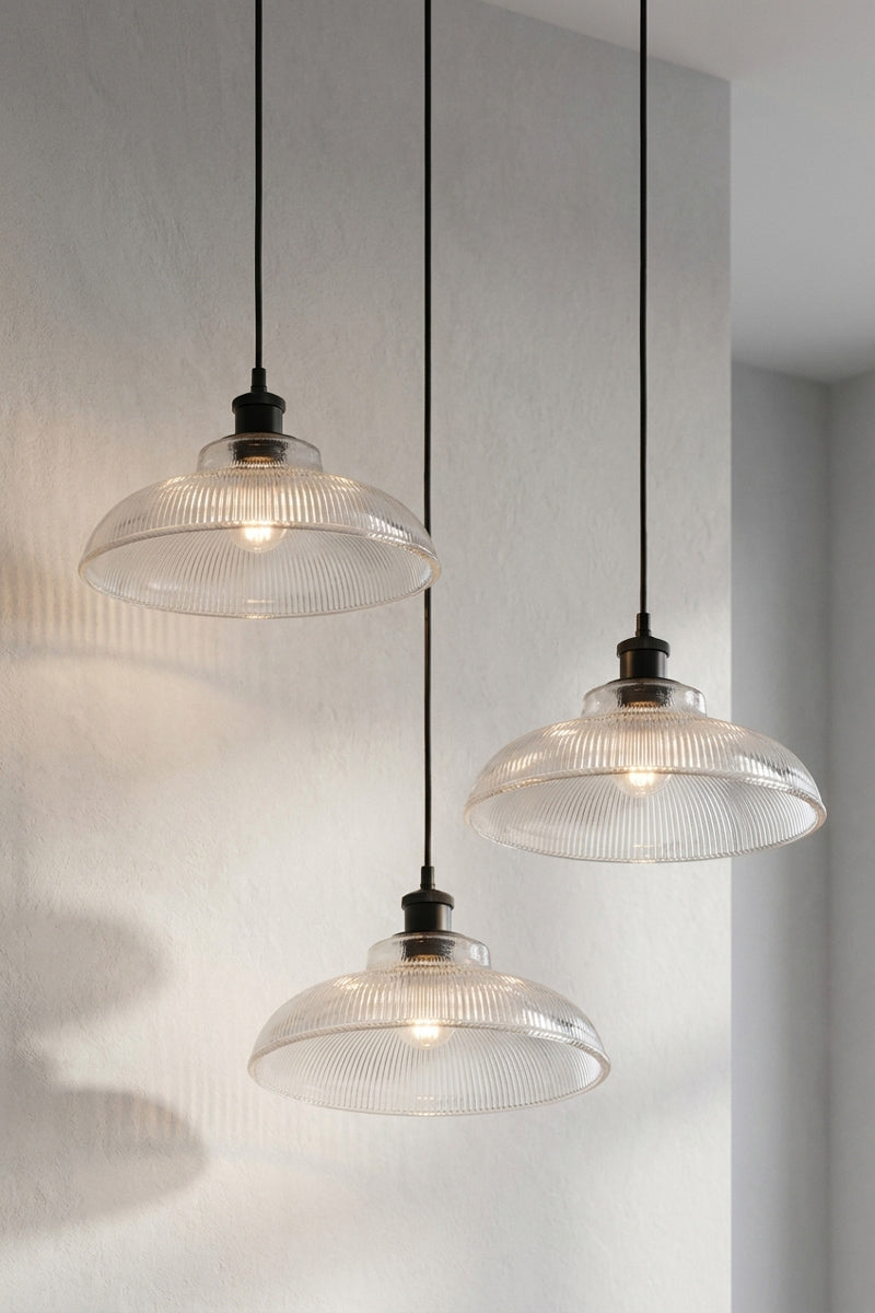 Three curved clear glass shaes are wide, low and commanding. 