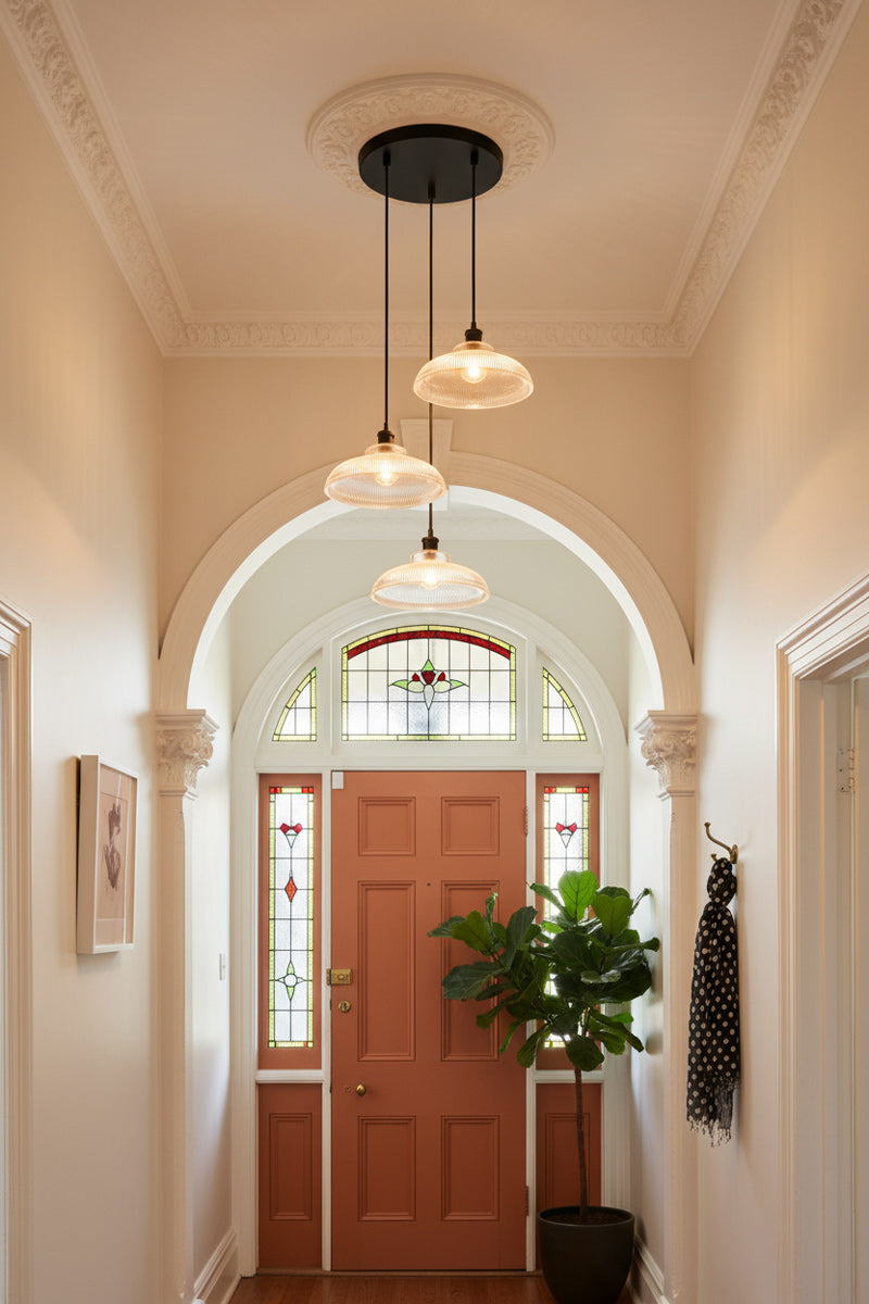 Victoiran house and Sur Glass Multi Light Pendant unites three wide, low holophane-style glass shades on a single circular canopy in hallway 