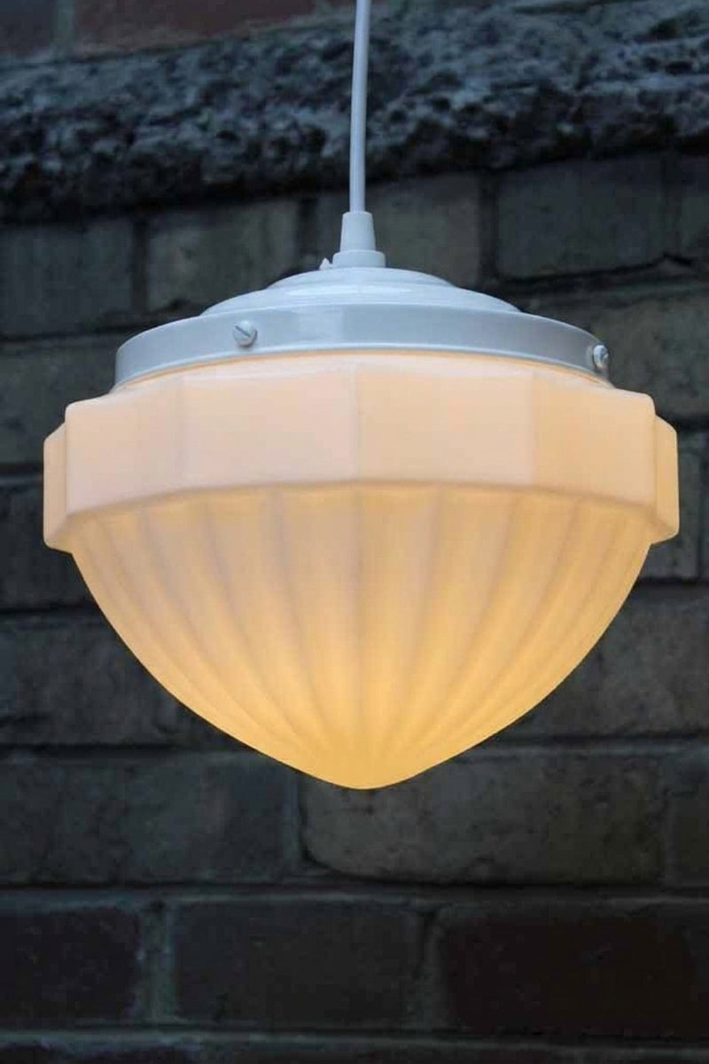 Elegant glass shade of the victorian era with white pendant cord.