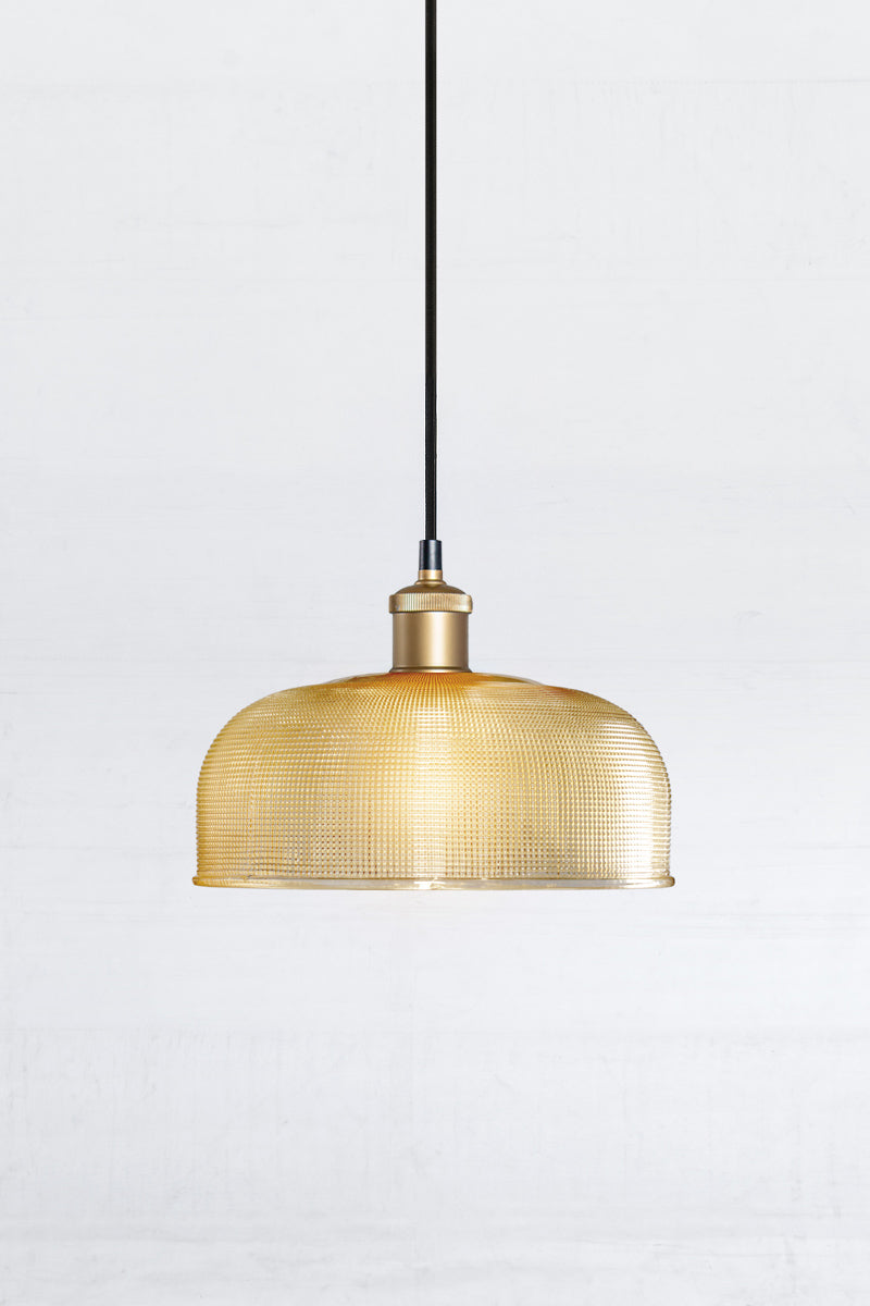  Large holophane amber glass style shade with a gold/brass pendant cord. 