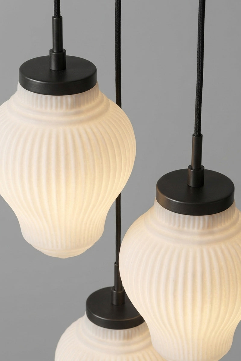 Adelphi Glass Pendant Lights on a 3 drop ceiling rose. Opal glass ribbed detailing