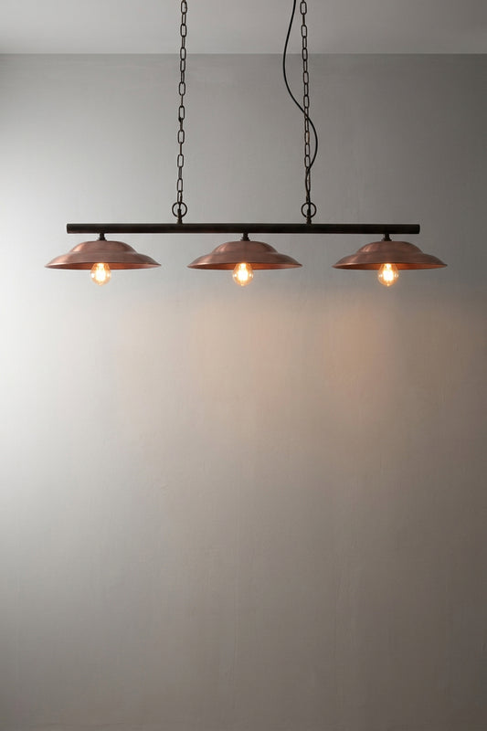 Barn Swing Pendant Light with three copper shades.
