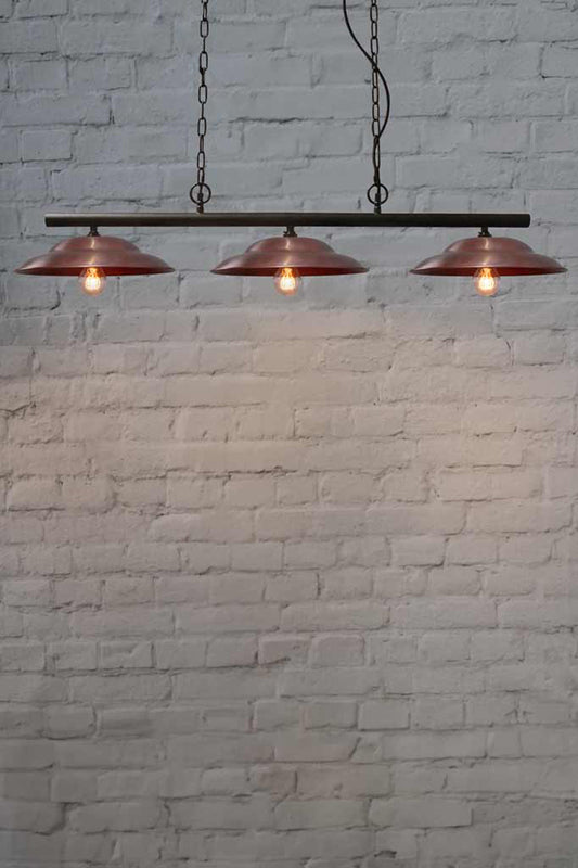 Barn Swing Pendant Light with three copper shades.