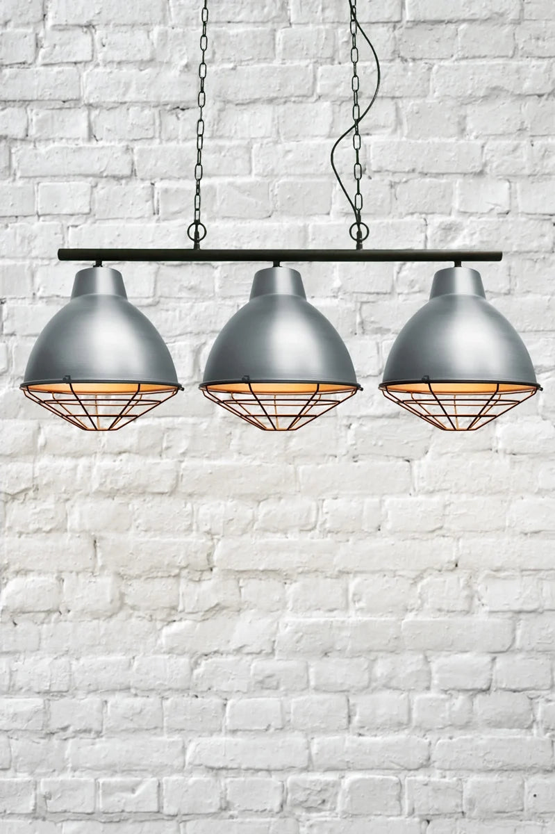 Steel three light pendant with black cage covers