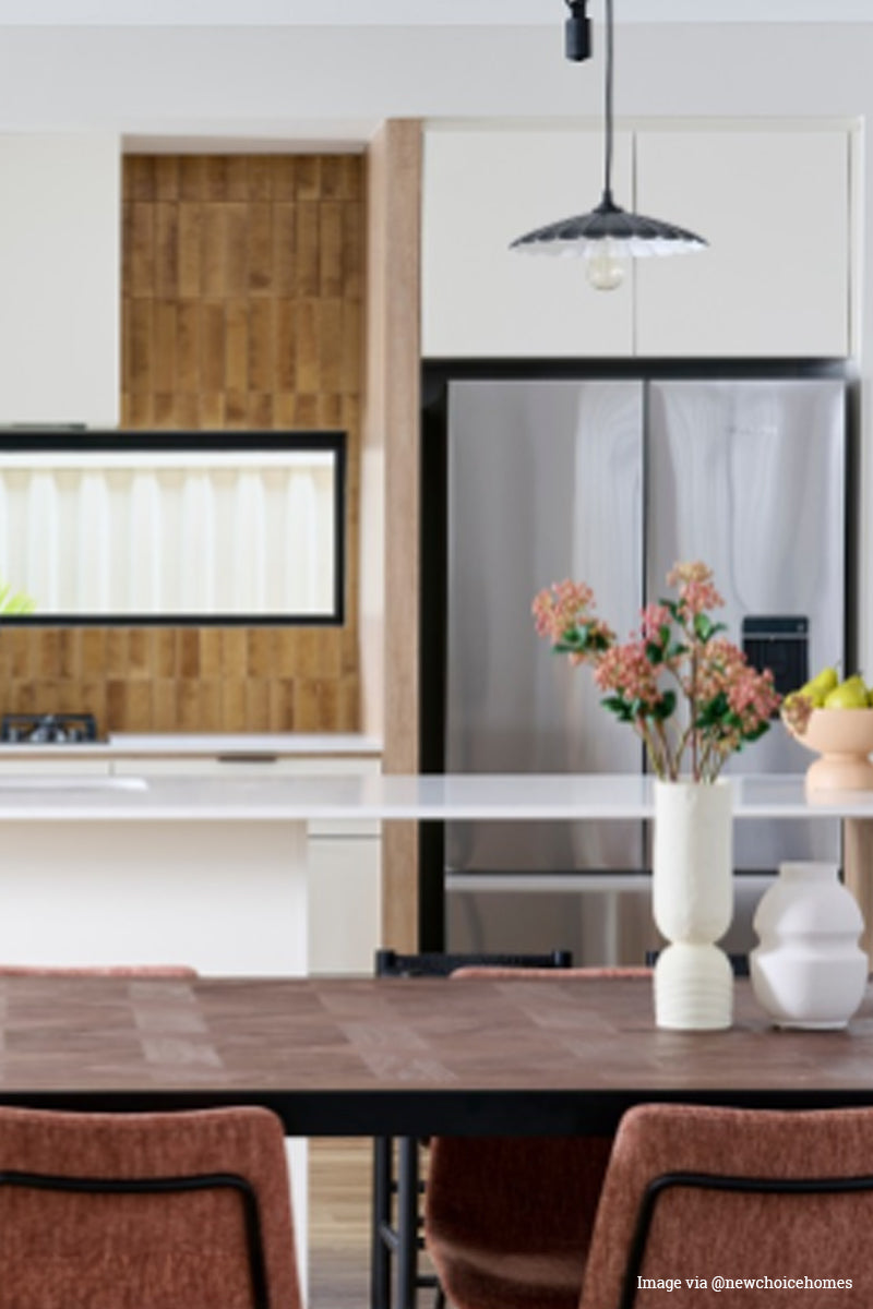 Image via@newchoisehomes: Metal umbrella shade in a modern kitchen