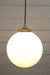 Gold brass round cord pendant light with large opal shade