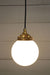 Gold brass round cord pendant light with small opal shade