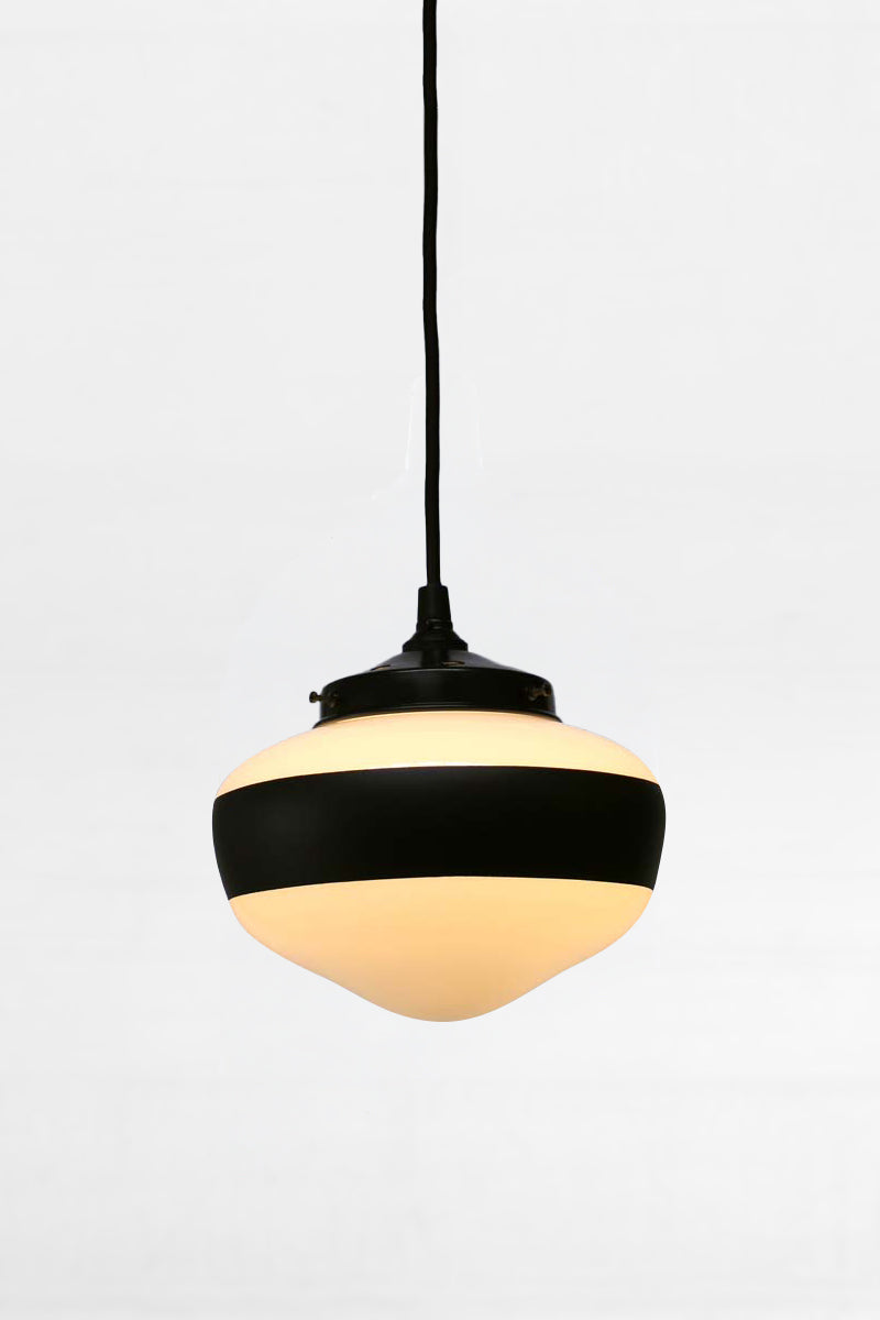 Black pendant cord with small one stripe shade