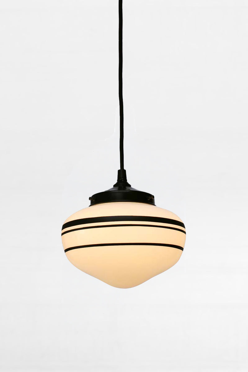 Black round pendant cord with small three stripe shade
