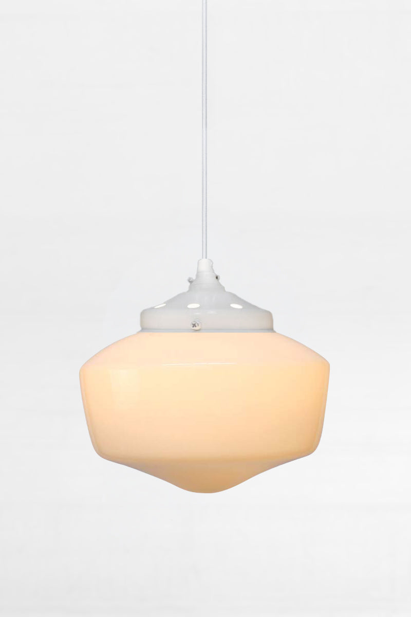 Small opal glass shade on a white pendant cord