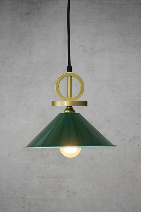 Small green pendant light with gold cord with disc
