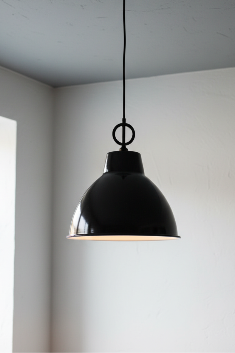 Black enamel loft shade with a black Dixon pendant cord. 