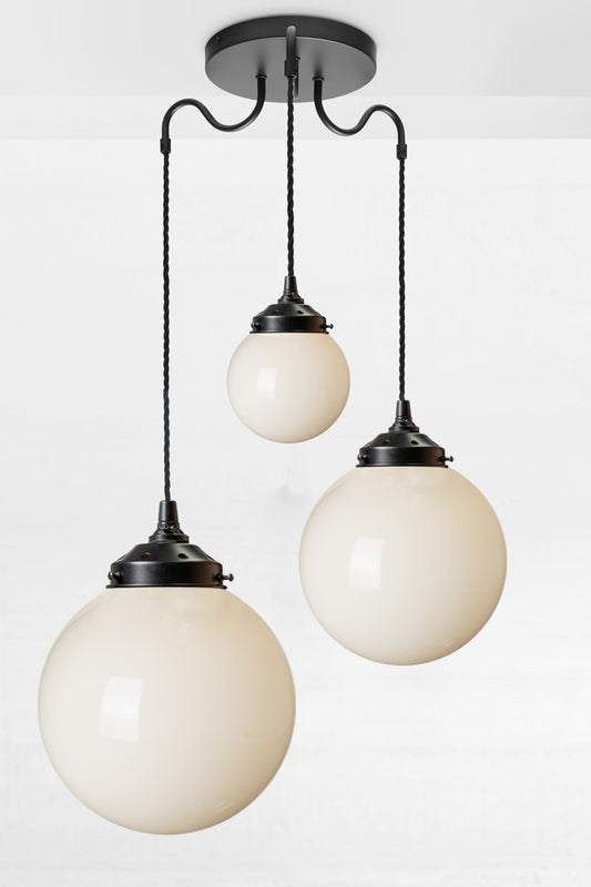 Three light pendant with opal shades
