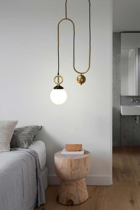 pendant light on side of bed
