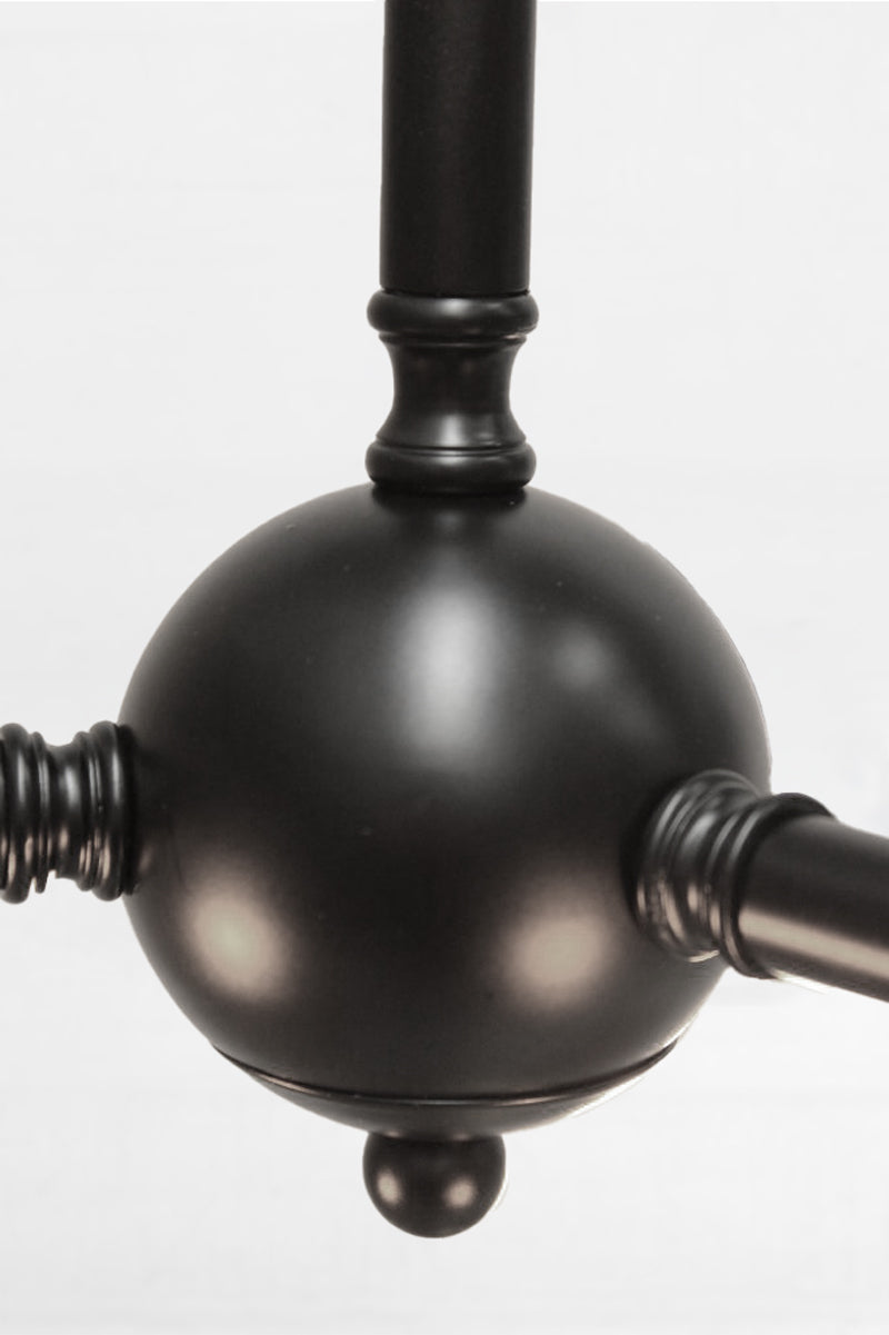 Close up of the centre ball of the black pendant frame. 