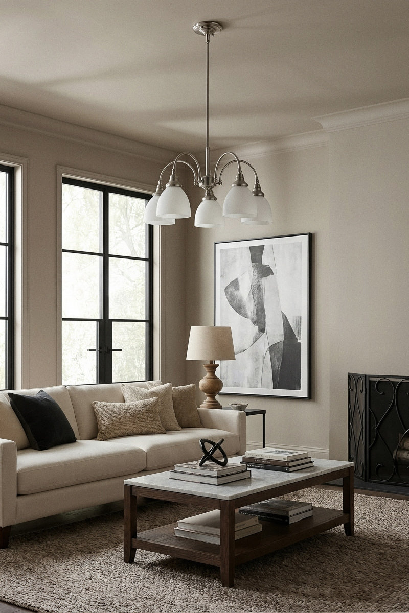 Larage 5 light chandelier in brushed Nickel with opal glass shades in a contemporary living space. 