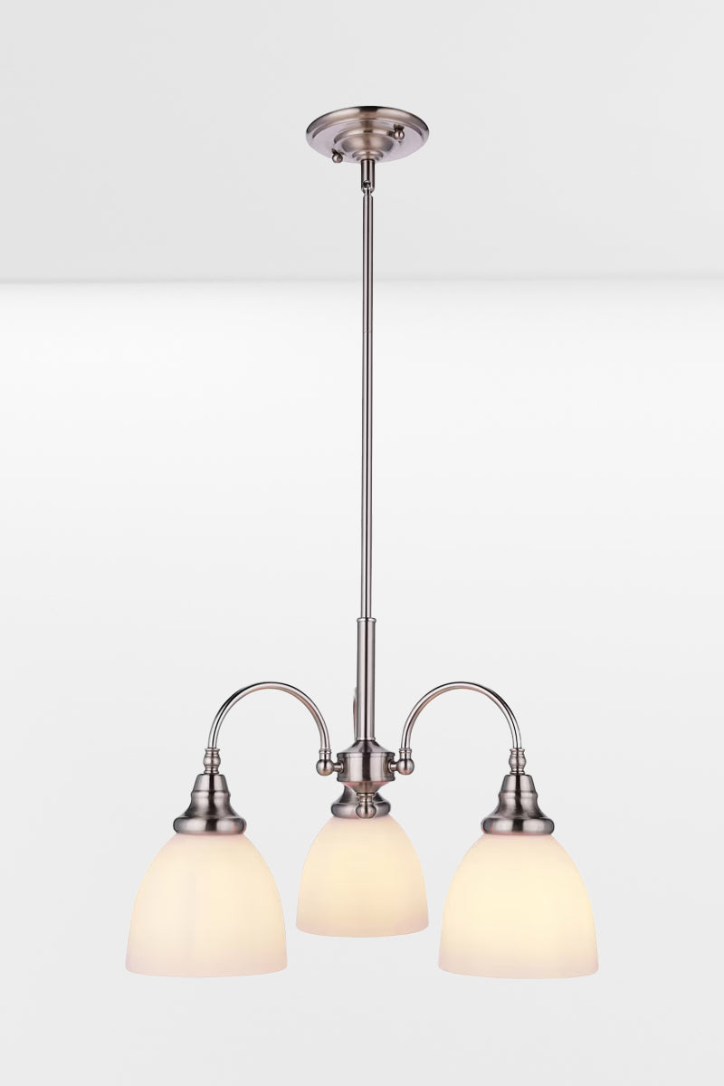 Illuminated small 3 light brushed nickel finished chandelier with opal glass shades, facing downwards. 
