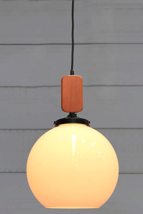 Large open glass pendant with wooden block cord