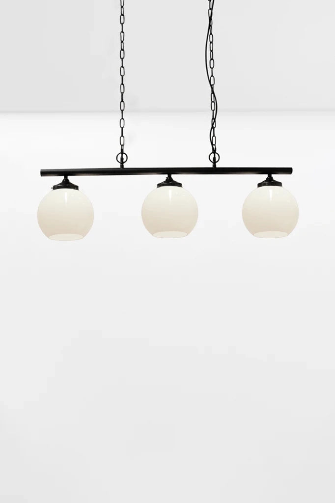 black three light pendant with medium open glass opal shades