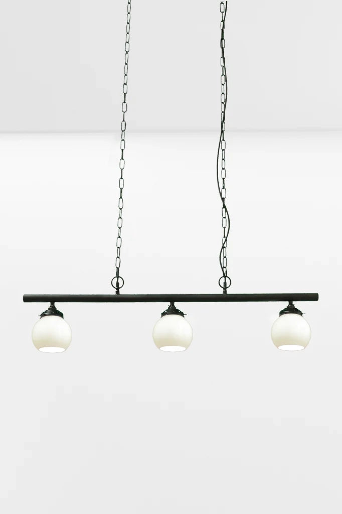 black three light pendant with small open glass opal shades