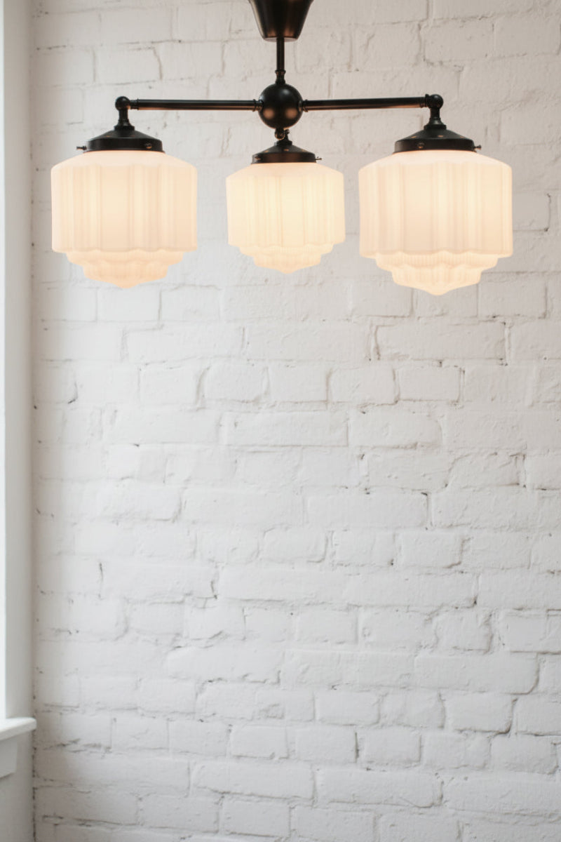 Triple light flush mount with opal deco shades