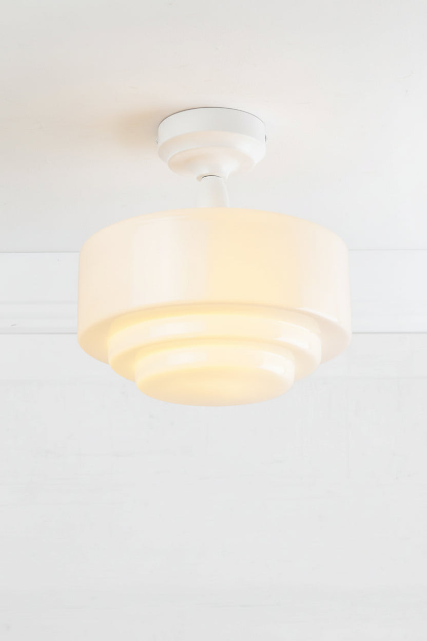 Opal glass stepped shade with a white batten holder.