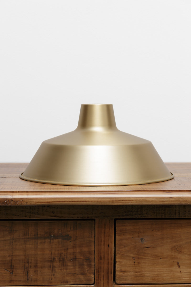 Bright Solid Brass shade. 