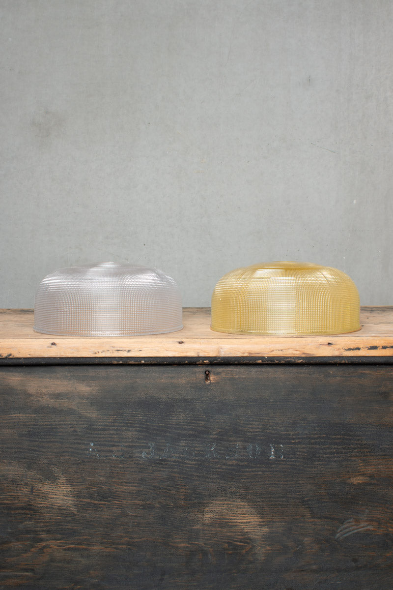 Clear and amber finished large glass crosshatch shades. 