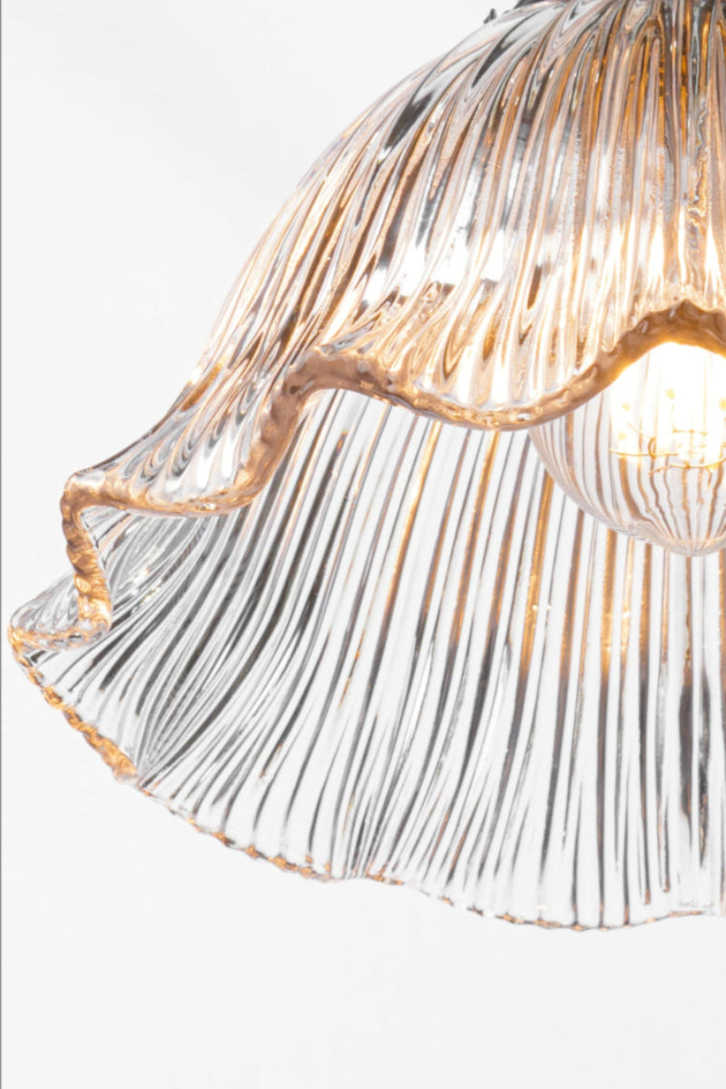 como frill on black wall sconce