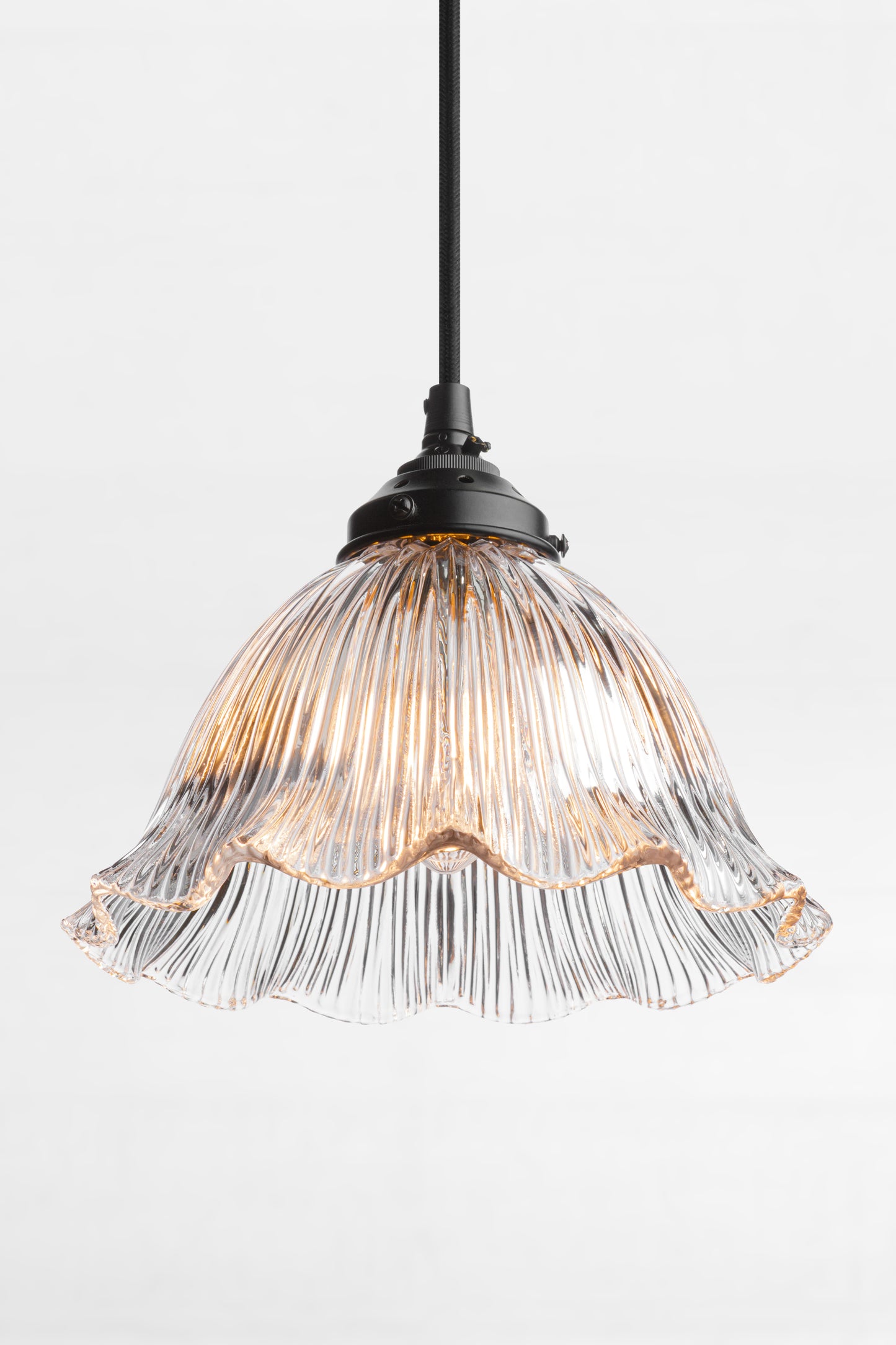 Frill edged clear small shade with black cord