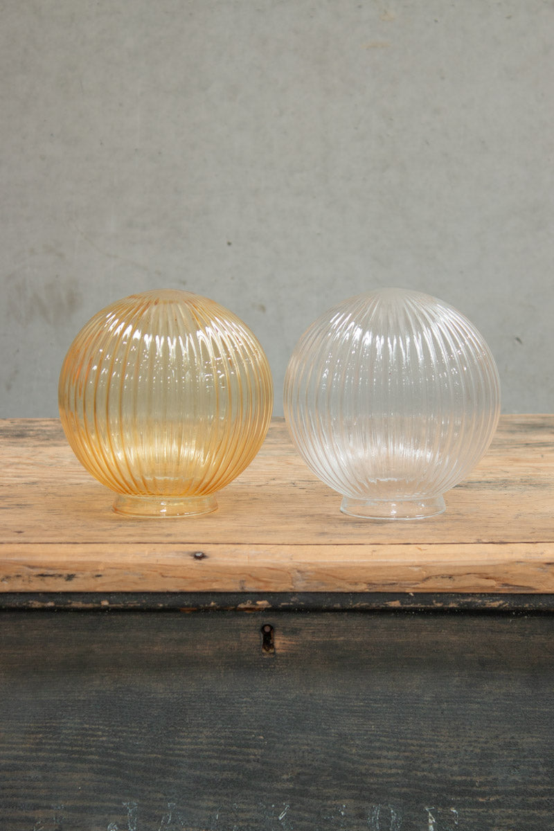 Reeded glass ball shades in clear and amber