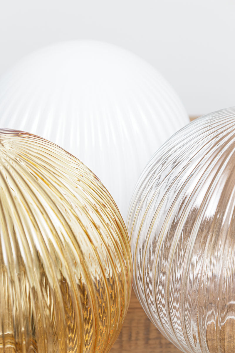 Close up of the reeded glass shades in amber, clear and opal. 