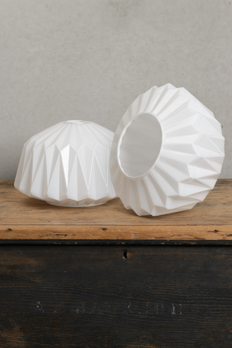 Unique opal glass shade design features modern geometric details