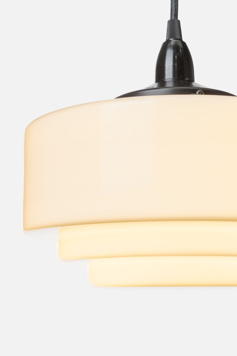 Close up of the opal schoolhouse shade with stepped detailing.