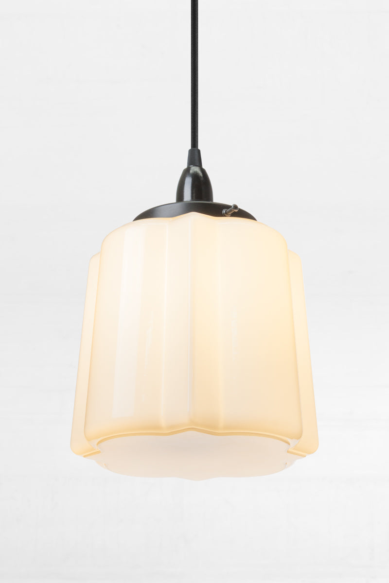 Opal glass unique deco shade on a black cord and lampholder