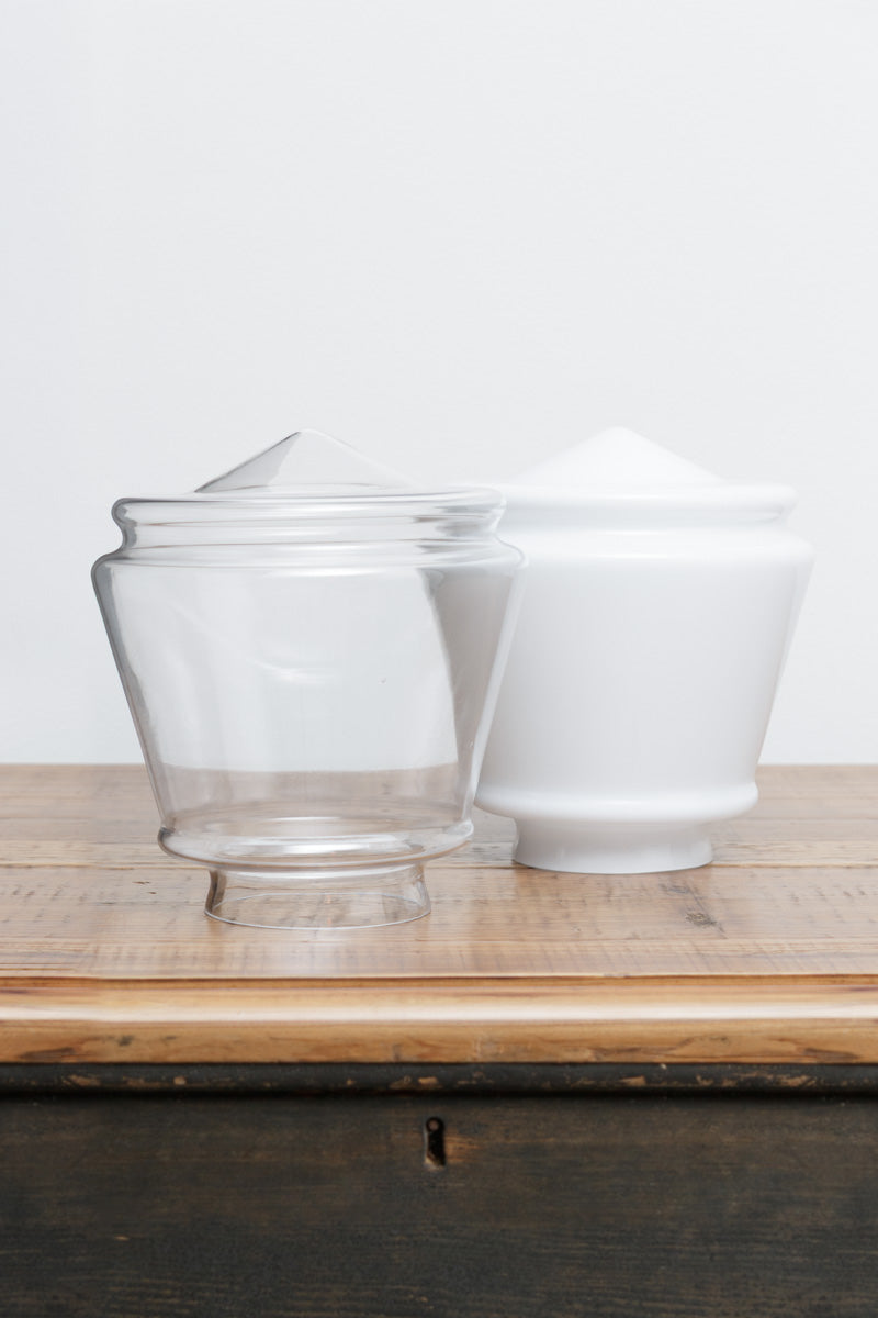 The opal glass shade will softly diffuse light whilst the clear shade will allow light to pass through for optimum brightness