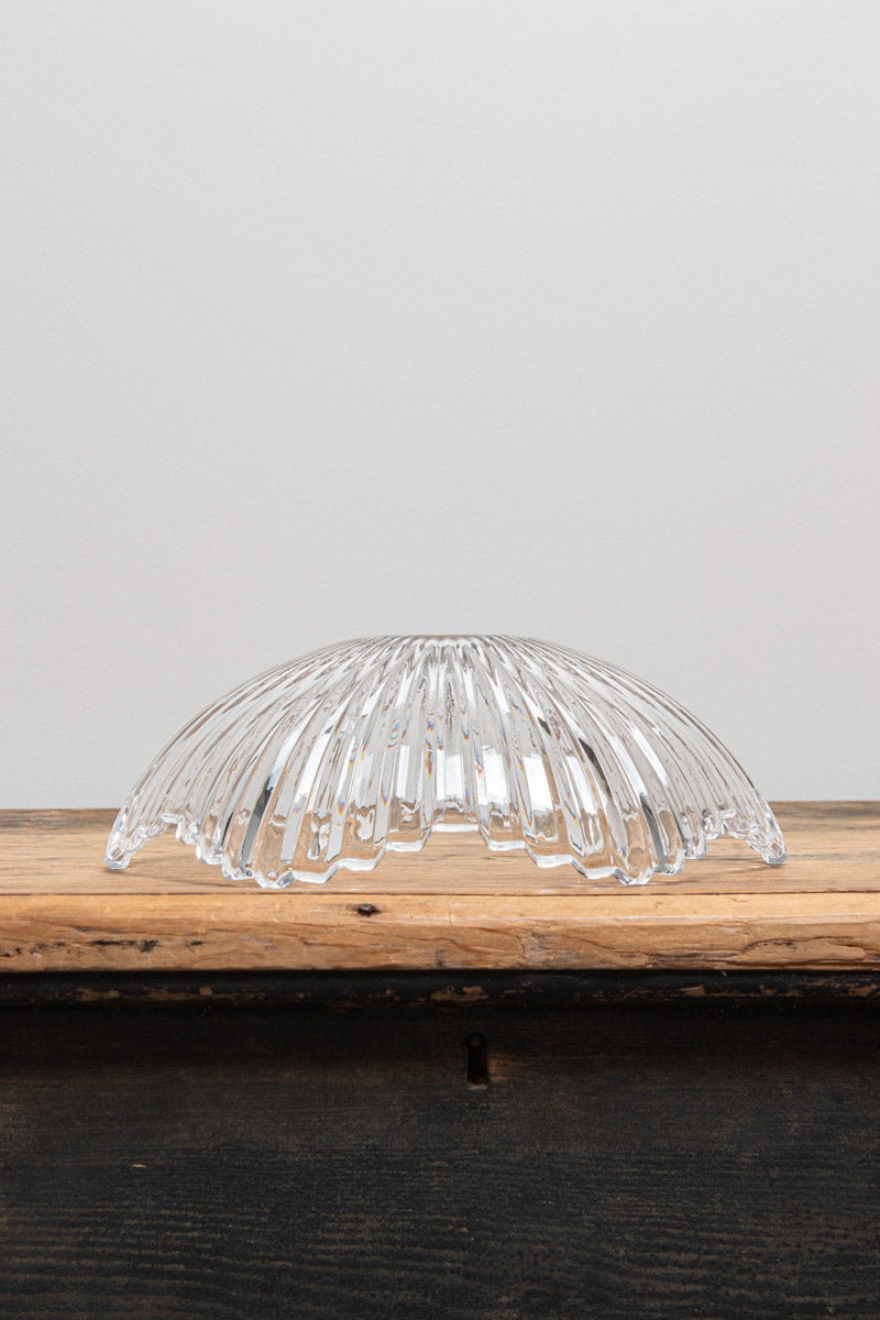 Clear glass Hepburn shade with fluted detail on a timber bench