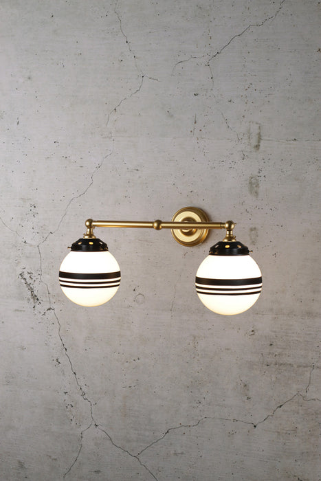 Gold steel sconce with opal three stripe shades