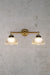 Holophane glass double arm wall light with gold sconce