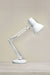 Adjustable task lighting for desk in white
