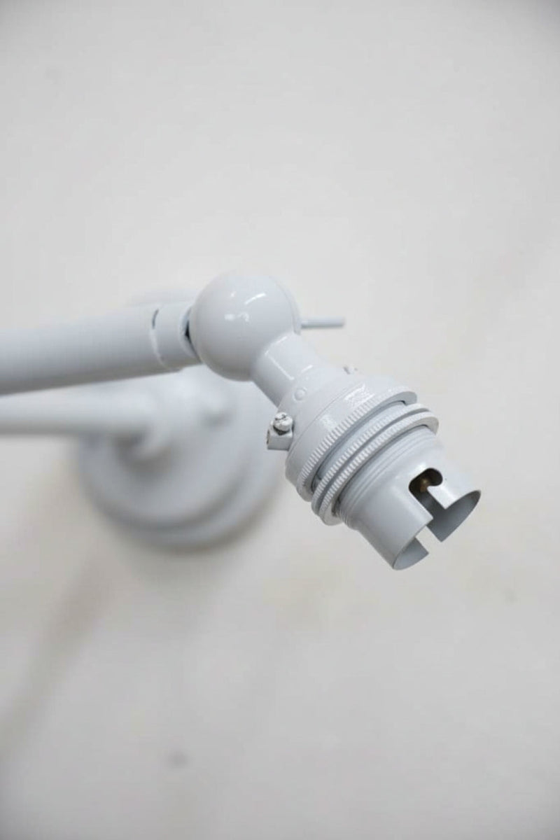 Close up of the lampholder on the white double swivel lamp holder