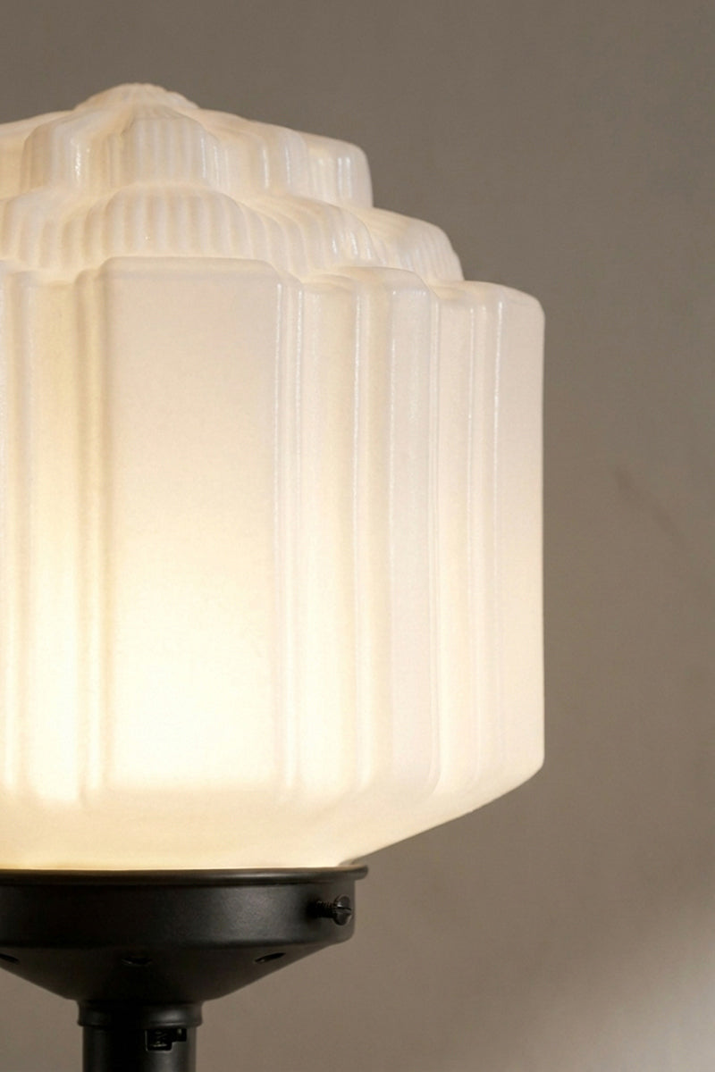 Opal glass art deco shade with black base and black gallery close-up