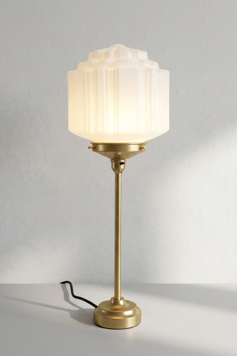 Art deco table lamp with gold base and gold gallery