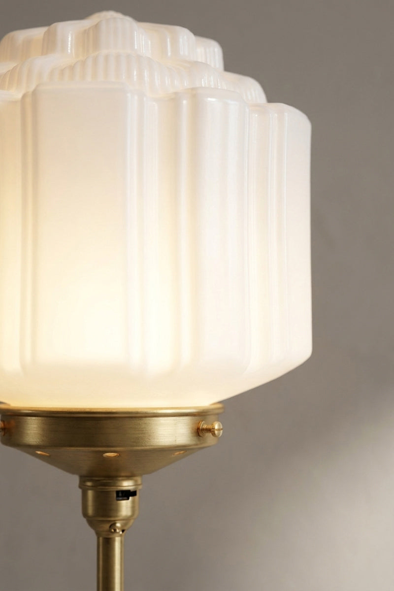 Opal glass art deco shade with gold base and gold gallery close-up