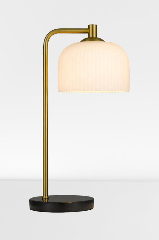 Table lamp with a ribbed opal glass shade, antique brass iron stande and solid marble base in black.